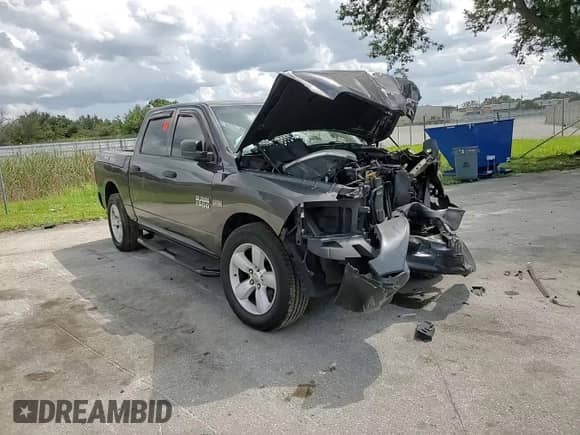 2016 Ram 1500 Tradesman z VIN 1C6RR6KT7GS233824, wystawiony jako Copart lot #71791554 z przebiegiem Nie podano mil oraz Szkoda całkowita • Salvage title. Historia ofert i sprzedaży dostępna na DreamBid. Obrazek 11.