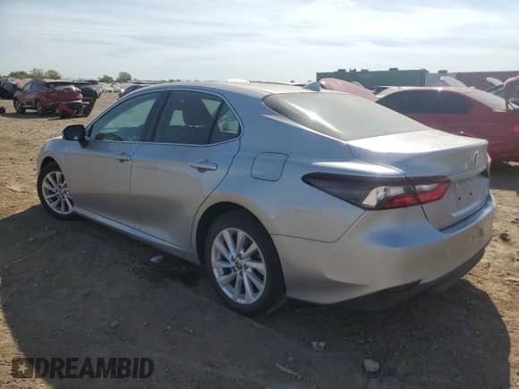 2021 Toyota Camry LE z VIN 4T1R11AK8MU455540, wystawiony jako Copart lot #82185805 z przebiegiem 16 292 mil mil oraz Szkoda całkowita • Salvage title. Historia ofert i sprzedaży dostępna na DreamBid. Obrazek 2.
