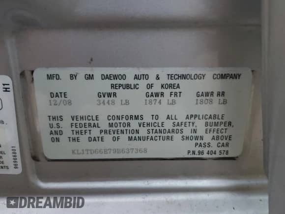 2009 Chevrolet Aveo 1LT z VIN KL1TD66E79B637368, wystawiony jako Copart lot #76706294 z przebiegiem 96 478 mil mil oraz Szkoda całkowita • Salvage title. Historia ofert i sprzedaży dostępna na DreamBid. Obrazek 13.