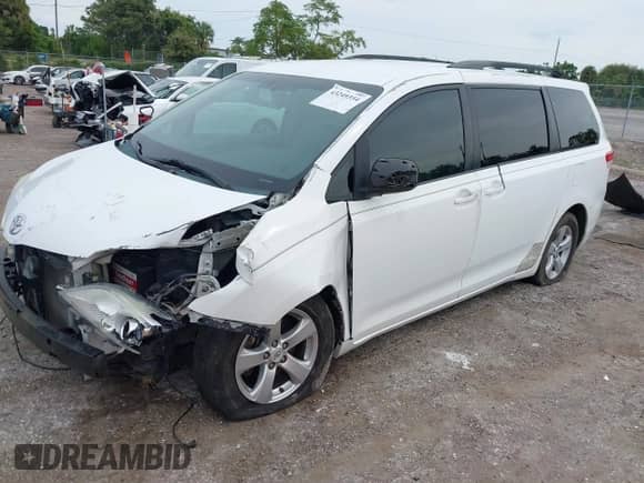 2012 Toyota Sienna LE AAS with VIN 5TDKK3DC8CS259698, listed as a IAAI auction lot 43249354 with 340,370 mi miles and . Bid and sale history available at DreamBid. Image 2.