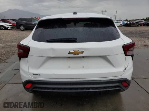 2024 Chevrolet Trax LS with VIN KL77LFE21RC097110, listed as a Copart auction lot 70520975 with Not provided miles and Salvage title. Bid and sale history available at DreamBid. Image 6.