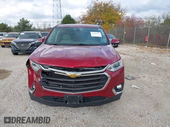 2018 Chevrolet Traverse LT Cloth z VIN 1GNEVGKW5JJ235448, wystawiony jako IAAI lot #43555205 z przebiegiem 111 945 mil mil oraz . Historia ofert i sprzedaży dostępna na DreamBid. Obrazek 12.