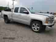 2015 Chevrolet Silverado 1500 LT with VIN 1GCRCREC1FZ356628, listed as a Copart auction lot 68770715 with 307,875 mi miles and Salvage title. Bid and sale history available at DreamBid. Image 4.