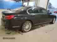 2017 BMW 7 Series 740i xDrive with VIN WBA7E4C53HGU99097, listed as a Copart auction lot 43945695 with 117,790 mi miles and Salvage title. Bid and sale history available at DreamBid. Image 3.