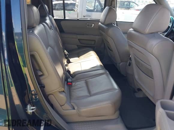 2009 Honda Pilot Touring with VIN 5FNYF38839B003759, listed as a IAAI auction lot 42594357 with 208,297 mi miles and . Bid and sale history available at DreamBid. Image 8.