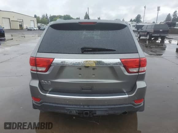 2012 Jeep Grand Cherokee Limited z VIN 1C4RJFBG2CC187150, wystawiony jako Copart lot #84956805 z przebiegiem 136 040 mil mil oraz Szkoda całkowita • Salvage title. Historia ofert i sprzedaży dostępna na DreamBid. Obrazek 6.