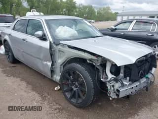 2006 Chrysler 300 C SRT-8 with VIN 2C3LA73W06H389007, listed as a IAAI auction lot 42244006 with 91,002 mi miles and . Bid and sale history available at DreamBid. Image 1.