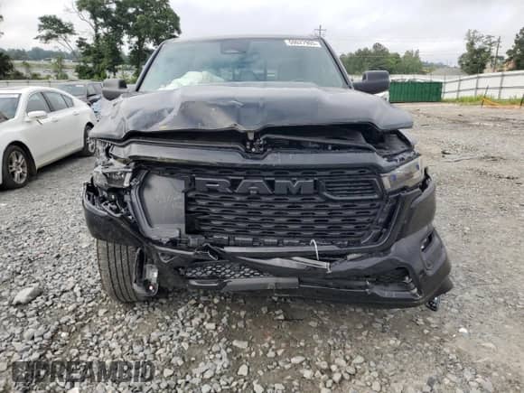 2025 Ram 1500 Tradesman with VIN 1C6RRFGG5SN592771, listed as a Copart auction lot 59027905 with 10,450 mi miles and Salvage title. Bid and sale history available at DreamBid. Image 5.