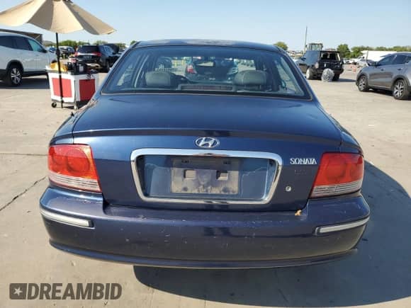 2003 Hyundai Sonata GLS z VIN KMHWF35H53A820125, wystawiony jako Copart lot #70974184 z przebiegiem 173 622 mil mil oraz Szkoda całkowita • Salvage title. Historia ofert i sprzedaży dostępna na DreamBid. Obrazek 6.