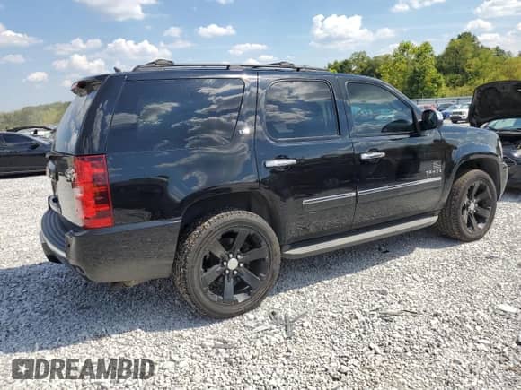 2014 Chevrolet Tahoe LTZ z VIN 1GNSKCE03ER112802, wystawiony jako Copart lot #80475795 z przebiegiem 254 450 mil mil oraz Czysty tytuł • Clean title. Historia ofert i sprzedaży dostępna na DreamBid. Obrazek 3.