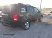 2015 Honda Pilot EX-L with VIN 5FNYF4H56FB052123, listed as a IAAI auction lot 43427901 with 197,741 mi miles and . Bid and sale history available at DreamBid. Image 4.