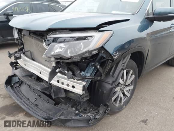 2022 Honda Pilot EX-L z VIN 5FNYF6H51NB018567, wystawiony jako IAAI lot #41835910 z przebiegiem 57 612 mil mil oraz . Historia ofert i sprzedaży dostępna na DreamBid. Obrazek 6.