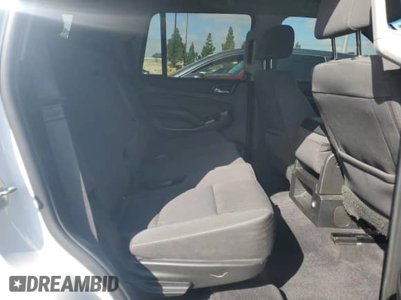 2019 Chevrolet Tahoe LS with VIN 1GNSCAEC6KR153562, listed as a Copart auction lot 82231855 with 71,474 mi miles and Salvage title. Bid and sale history available at DreamBid. Image 11.