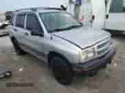 2002 Chevrolet Tracker with VIN 2CNBE13C926934704, listed as a Copart auction lot 70717194 with 189,076 mi miles and Salvage title. Bid and sale history available at DreamBid. Image 4.