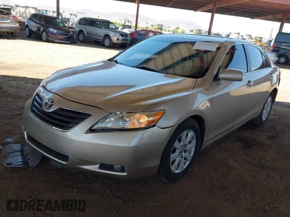 2007 Toyota Camry CE with VIN 4T1BE46KX7U002752, listed as a IAAI auction lot 42564859 with 124,580 mi miles and . Bid and sale history available at DreamBid. Image 17.