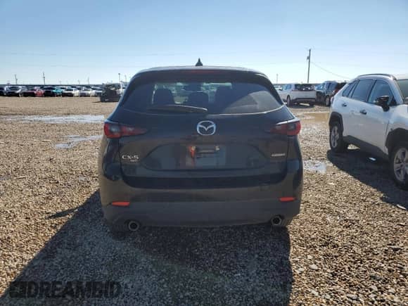 2023 Mazda CX-5 S Carbon Edition z VIN JM3KFBCM5P0168879, wystawiony jako Copart lot #90329475 z przebiegiem 37 994 mil mil oraz Szkoda całkowita • Salvage title. Historia ofert i sprzedaży dostępna na DreamBid. Obrazek 6.