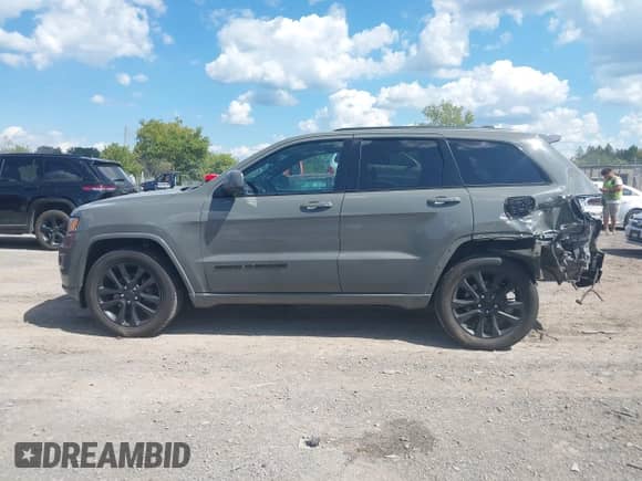 2020 Jeep Grand Cherokee Altitude with VIN 1C4RJFAG6LC236514, listed as a IAAI auction lot 43133478 with 124,368 mi miles and . Bid and sale history available at DreamBid. Image 14.