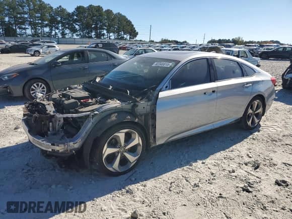 2018 Honda Accord Touring z VIN 1HGCV2F91JA006919, wystawiony jako Copart lot #82345515 z przebiegiem 128 886 mil mil oraz Szkoda całkowita • Salvage title. Historia ofert i sprzedaży dostępna na DreamBid. Obrazek 1.