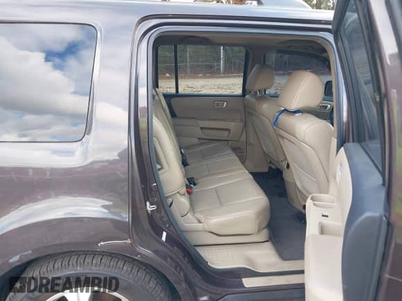 2013 Honda Pilot EX-L with VIN 5FNYF4H59DB013703, listed as a IAAI auction lot 43324425 with 248,844 mi miles and . Bid and sale history available at DreamBid. Image 8.