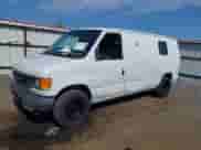 2005 Ford Econoline Cargo with VIN 1FTRE14W25HA02113, listed as a IAAI auction lot 42725718 with 126,456 mi miles and . Bid and sale history available at DreamBid. Image 2.