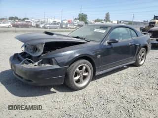 2003 Ford Mustang GT Deluxe с VIN 1FAFP42X03F320224, выставлен на аукционе Copart как лот 60493405 с пробегом 183 772 миль миль и Списание • Salvage title. История ставок и продаж доступна на DreamBid. Изображение 1.