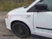 2014 Dodge Grand Caravan SE with VIN 2C4RDGBG6ER458881, listed as a IAAI auction lot 43574110 with 189,082 mi miles and . Bid and sale history available at DreamBid. Image 6.