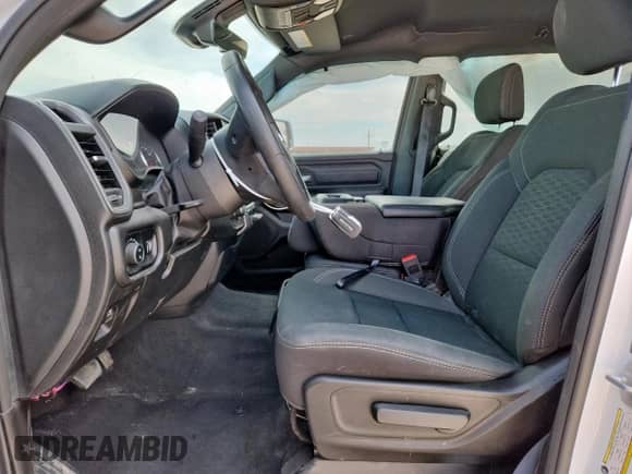 2025 Ram 1500 Tradesman with VIN 1C6RREGG8SN712282, listed as a Copart auction lot 81009595 with 8,097 mi miles and Salvage title. Bid and sale history available at DreamBid. Image 7.