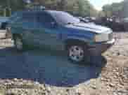 2002 Jeep Grand Cherokee Laredo with VIN 1J4GW48S42C251464, listed as a Copart auction lot 71964815 with 144,429 mi miles and Salvage title. Bid and sale history available at DreamBid. Image 4.