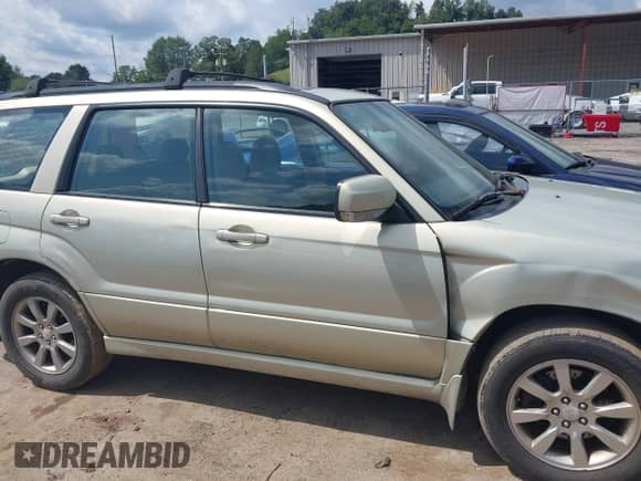 2007 Subaru Forester X with VIN JF1SG65607H732831, listed as a IAAI auction lot 42970021 with 170,388 mi miles and . Bid and sale history available at DreamBid. Image 6.