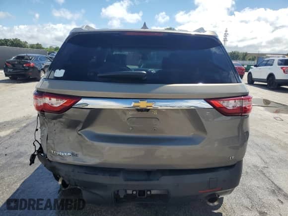 2018 Chevrolet Traverse LT с VIN 1GNERHKW8JJ160271, выставлен на аукционе Copart как лот 70884115 с пробегом 121 416 миль миль и Списание • Salvage title. История ставок и продаж доступна на DreamBid. Изображение 6.