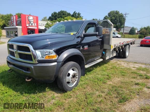 2011 Dodge RAM with VIN 3D6WA7EL2BG627679, listed as a Copart auction lot 68119115 with 146,482 mi miles and Clean title. Bid and sale history available at DreamBid. Image 2.