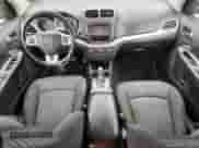 2014 Dodge Journey SE with VIN 3C4PDDAG0ET284651, listed as a Copart auction lot 64187145 with 182,485 mi miles and Salvage title. Bid and sale history available at DreamBid. Image 8.