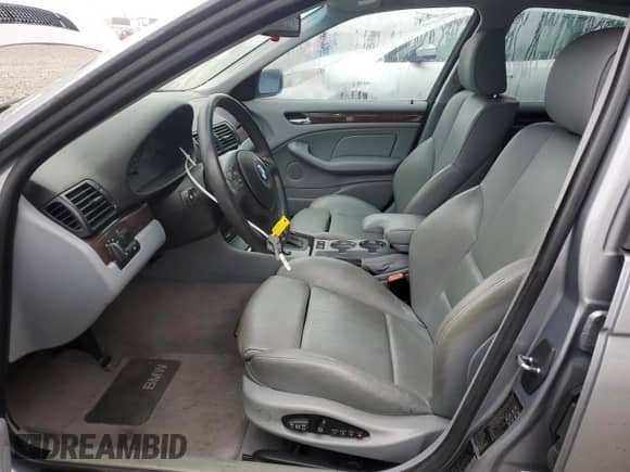 2004 BMW 3 Series 325i with VIN WBAAZ33474KP82704, listed as a Copart auction lot 90720105 with 122,580 mi miles and Clean title. Bid and sale history available at DreamBid. Image 7.