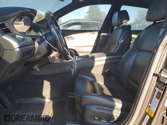 2015 BMW 5 Series 535i Gran Turismo с VIN WBA5M2C50FD872125, выставлен на аукционе Copart как лот 76184974 с пробегом 131 090 миль миль и Списание • Salvage title. История ставок и продаж доступна на DreamBid. Изображение 7.