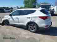 2017 Hyundai Santa Fe 2.4L z VIN 5NMZUDLB3HH029892, wystawiony jako IAAI lot #43049357 z przebiegiem 107 077 mil mil oraz . Historia ofert i sprzedaży dostępna na DreamBid. Obrazek 3.