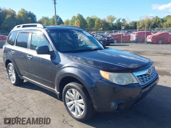 2012 Subaru Forester X Premium z VIN JF2SHADC6CH430943, wystawiony jako IAAI lot #43407192 z przebiegiem 162 606 mil mil oraz . Historia ofert i sprzedaży dostępna na DreamBid. Obrazek 1.