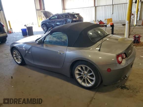 2005 BMW Z4 2.5i with VIN 4USBT33595LS58378, listed as a Copart auction lot 73654404 with 56,004 mi miles and Salvage title. Bid and sale history available at DreamBid. Image 2.