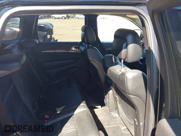 2013 Jeep Grand Cherokee Limited z VIN 1C4RJFBT8DC657129, wystawiony jako IAAI lot #43372561 z przebiegiem 157 836 mil mil oraz . Historia ofert i sprzedaży dostępna na DreamBid. Obrazek 8.