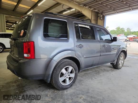 2011 Honda Pilot EX-L z VIN 5FNYF4H7XBB084519, wystawiony jako Copart lot #68644595 z przebiegiem 186 578 mil mil oraz Szkoda całkowita • Salvage title. Historia ofert i sprzedaży dostępna na DreamBid. Obrazek 3.