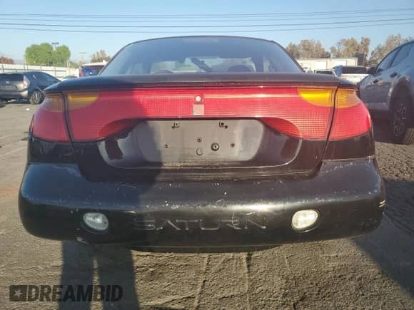 2002 Saturn SC with VIN 1G8ZN128X2Z242868, listed as a Copart auction lot 83045874 with Not provided miles and Clean title. Bid and sale history available at DreamBid. Image 6.