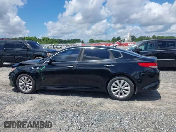 2016 Kia Optima EX with VIN 5XXGU4L31GG079123, listed as a IAAI auction lot 42430932 with 150,887 mi miles and . Bid and sale history available at DreamBid. Image 14.