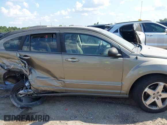 2007 Dodge Caliber R/T with VIN 1B3HB78K97D150415, listed as a IAAI auction lot 43267027 with 210,429 mi miles and . Bid and sale history available at DreamBid. Image 13.