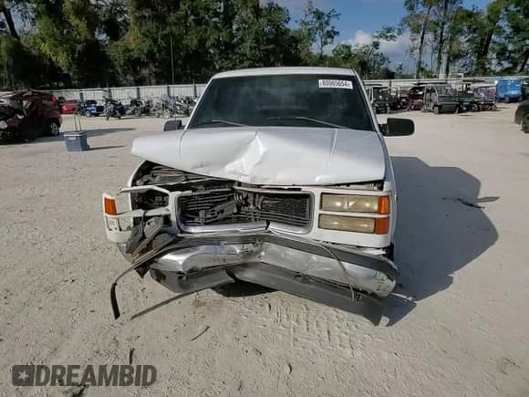 1998 GMC Sierra 1500 z VIN 1GTEC19M3WE518866, wystawiony jako Copart lot #80065654 z przebiegiem 462 621 mil mil oraz Szkoda całkowita • Salvage title. Historia ofert i sprzedaży dostępna na DreamBid. Obrazek 11.