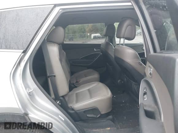 2013 Hyundai Santa Fe Limited with VIN KM8SRDHF8DU007870, listed as a IAAI auction lot 43296574 with 123,177 mi miles and . Bid and sale history available at DreamBid. Image 8.