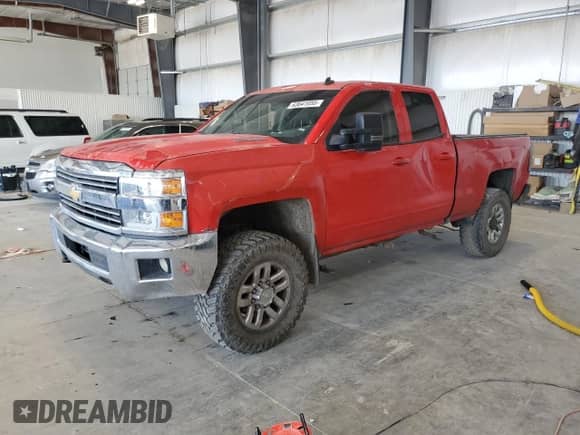 2016 Chevrolet Silverado 2500HD LT with VIN 1GC2KVEG1GZ158035, listed as a Copart auction lot 63641055 with 205,055 mi miles and Salvage title. Bid and sale history available at DreamBid. Image 1.