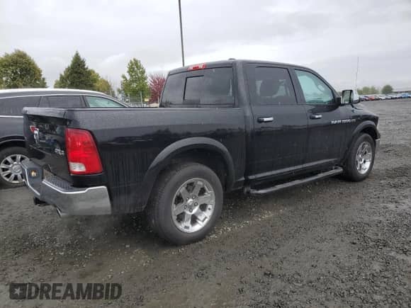 2012 Ram 1500 Laramie with VIN 1C6RD7NT5CS328280, listed as a Copart auction lot 84435235 with 65,297 mi miles and Salvage title. Bid and sale history available at DreamBid. Image 3.