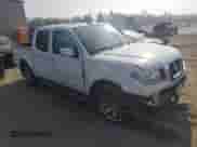 2019 Nissan Frontier SL with VIN 1N6AD0EVXKN771419, listed as a Copart auction lot 69157914 with 111,635 mi miles and Salvage title. Bid and sale history available at DreamBid. Image 4.