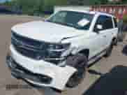 2015 Chevrolet Tahoe LT with VIN 1GNSKBKC1FR175813, listed as a IAAI auction lot 43113210 with 165,599 mi miles and . Bid and sale history available at DreamBid. Image 17.