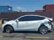 2023 Tesla Model Y Long Range с VIN 7SAYGDEE8PA034371, выставлен на аукционе IAAI как лот 42765729 с пробегом Не указан миль и . История ставок и продаж доступна на DreamBid. Изображение 13.