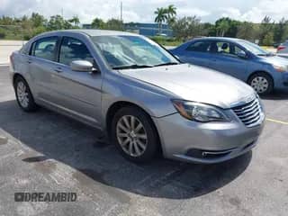 2013 Chrysler 200 Touring with VIN 1C3CCBBB0DN732866, listed as a IAAI auction lot 43410358 with 124,772 mi miles and . Bid and sale history available at DreamBid. Image 1.